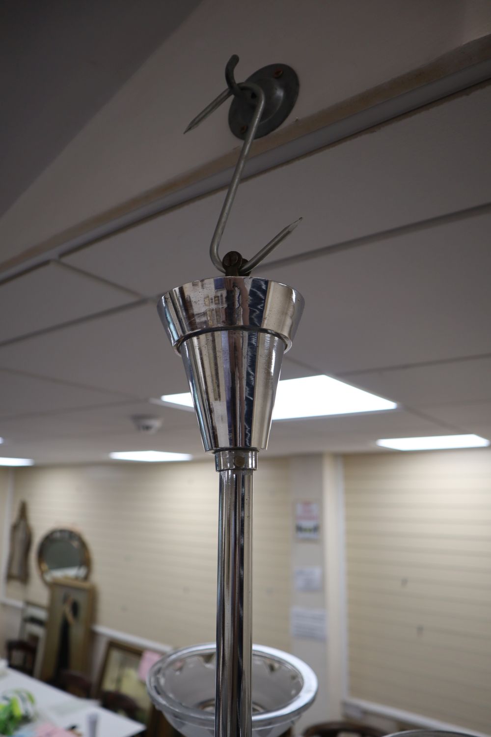 A French Art Deco style chrome plated and frosted glass six light electrolier, height 58cm width 64cm